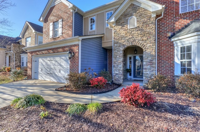 view of front of property with a garage