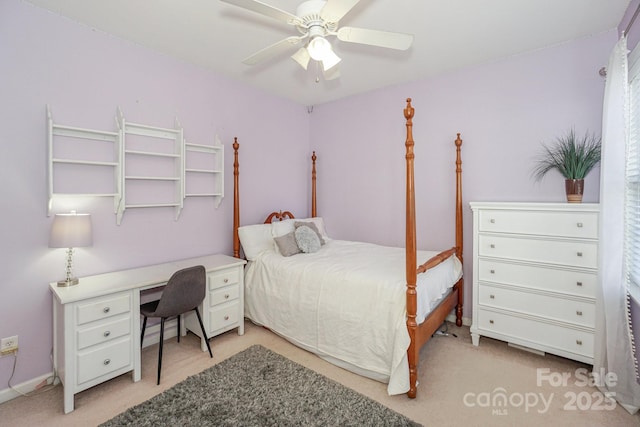 bedroom with light colored carpet and ceiling fan