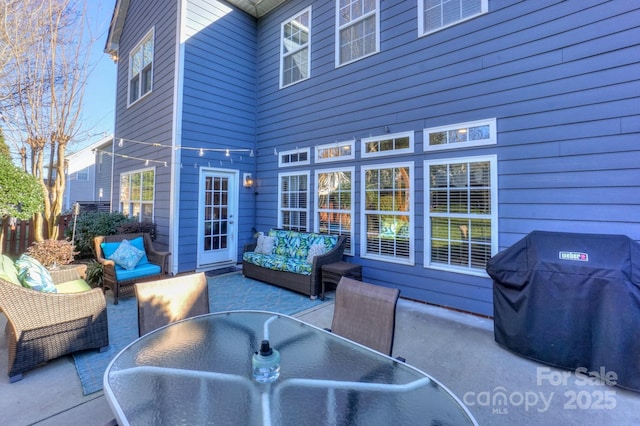 view of patio / terrace with grilling area and an outdoor hangout area