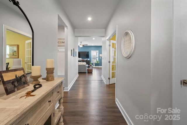 hall with dark hardwood / wood-style floors