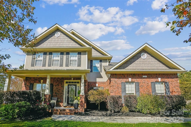 craftsman inspired home featuring a porch