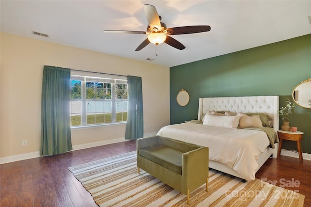 bedroom featuring ceiling fan and wood-type flooring