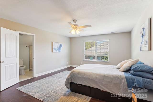 bedroom with ceiling fan and connected bathroom