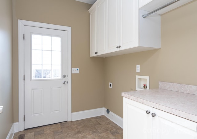 clothes washing area featuring cabinets, washer hookup, and electric dryer hookup