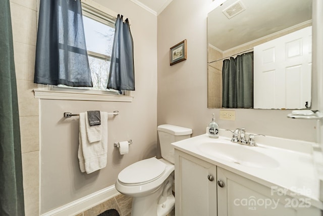 bathroom featuring a shower with curtain, ornamental molding, toilet, and vanity