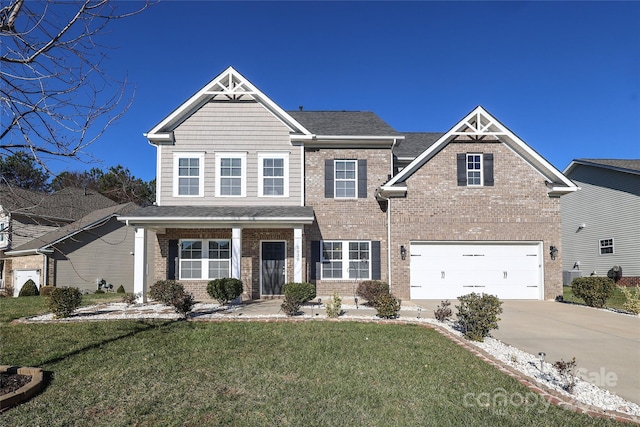 craftsman-style home with a garage and a front yard