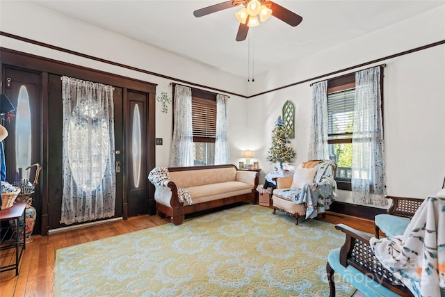 interior space featuring light wood-type flooring and ceiling fan