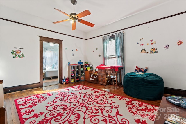 recreation room featuring ceiling fan and wood-type flooring