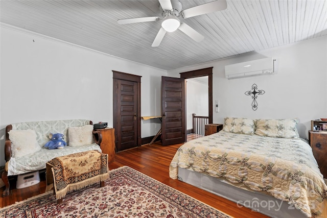 bedroom featuring dark hardwood / wood-style flooring, an AC wall unit, ceiling fan, and crown molding