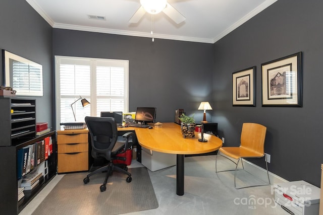 office space with ceiling fan, light colored carpet, and ornamental molding