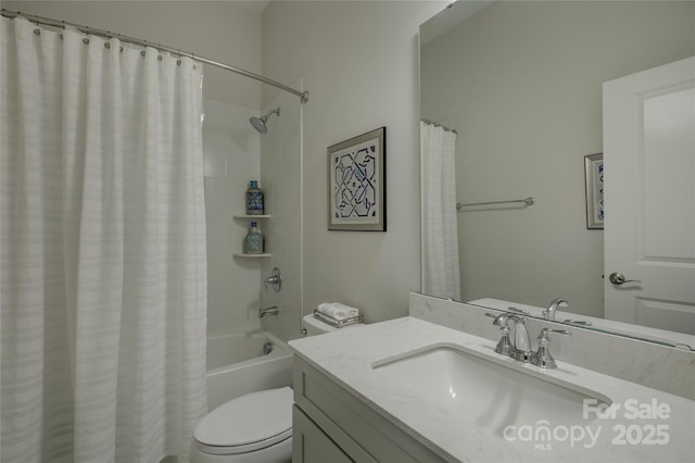 full bathroom featuring vanity, shower / tub combo, and toilet