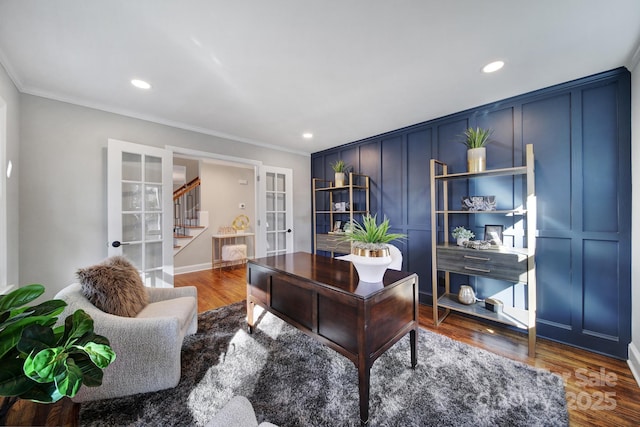 office with french doors, dark hardwood / wood-style flooring, and crown molding