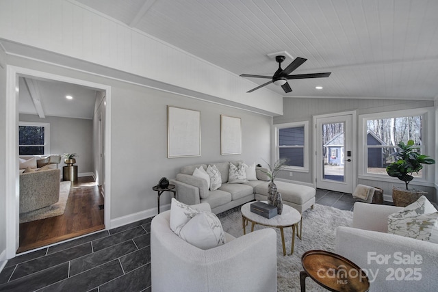 living room featuring wood ceiling, ceiling fan, dark tile patterned flooring, and vaulted ceiling