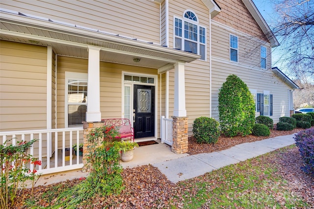 entrance to property with covered porch