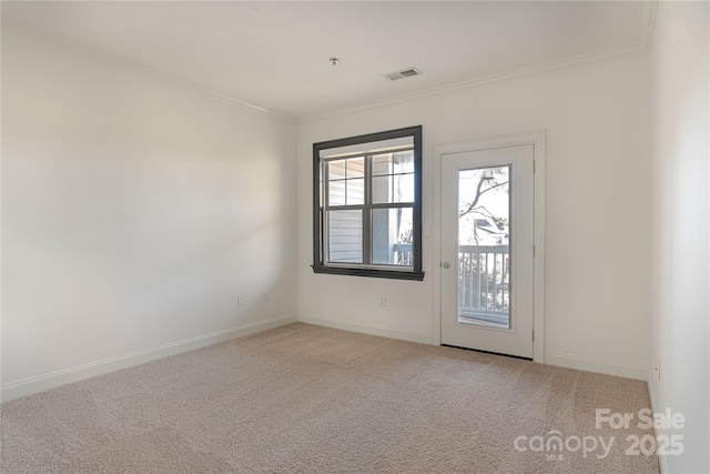 unfurnished room with light carpet and ornamental molding