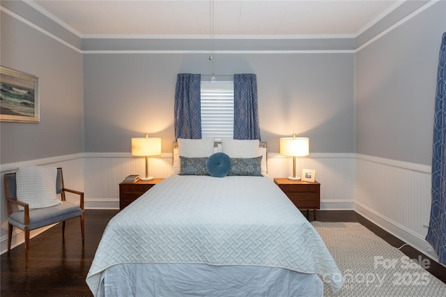 bedroom featuring dark hardwood / wood-style floors and crown molding