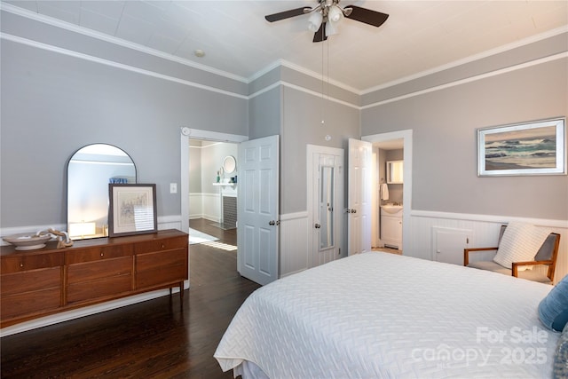 bedroom with connected bathroom, crown molding, ceiling fan, and dark wood-type flooring