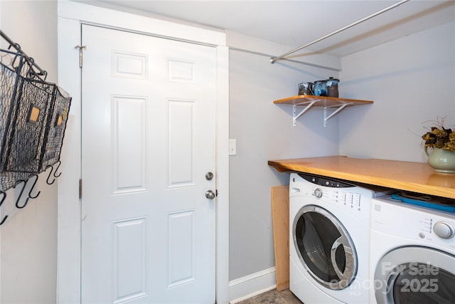 washroom featuring washing machine and clothes dryer