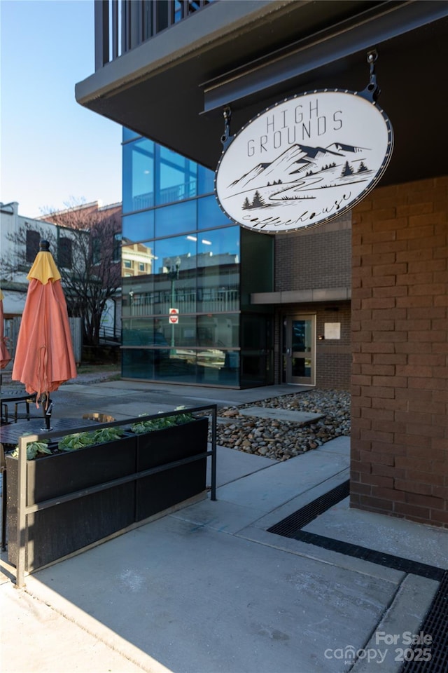 view of patio with a balcony