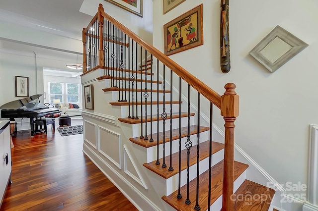 stairway with hardwood / wood-style floors