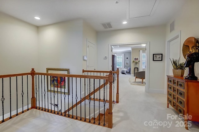 hallway with light carpet