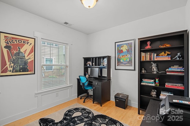 office featuring hardwood / wood-style flooring