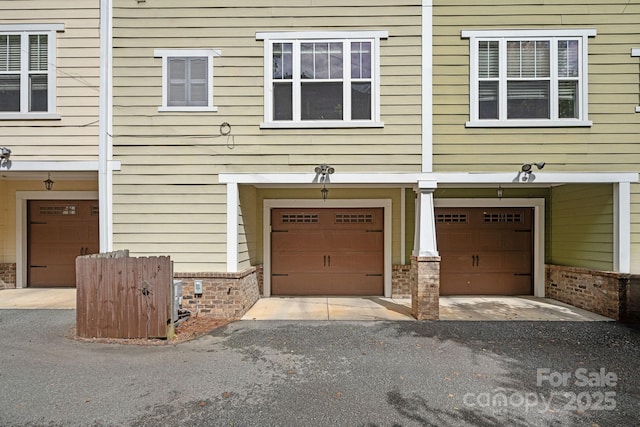 exterior space with a garage