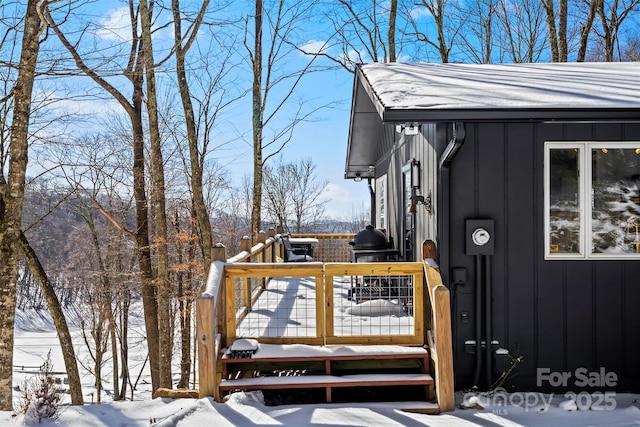 view of snow covered deck