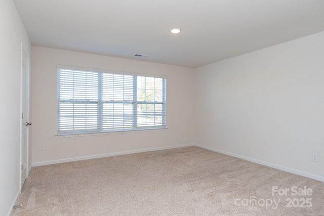 view of carpeted spare room