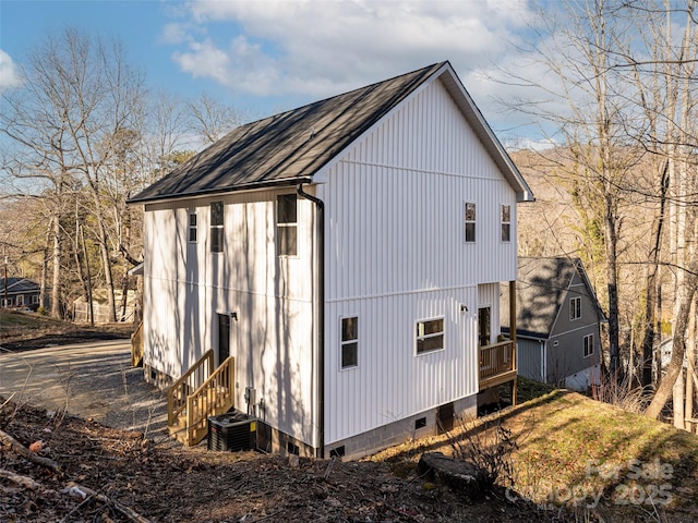 view of outbuilding with central AC unit