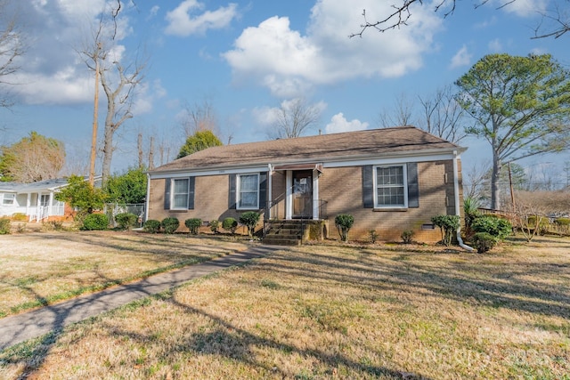 single story home with a front lawn