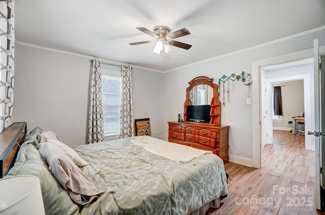 bedroom with light hardwood / wood-style flooring, ceiling fan, and crown molding