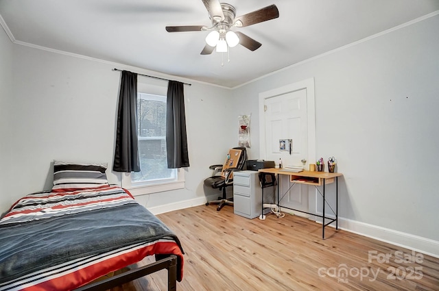 bedroom featuring light wood-type flooring, ceiling fan, and ornamental molding