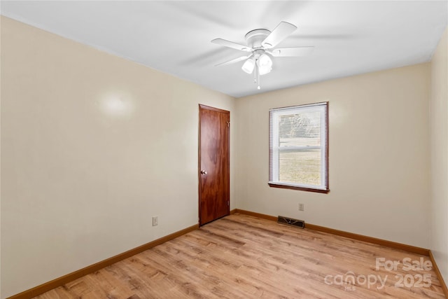 unfurnished room with light hardwood / wood-style floors and ceiling fan