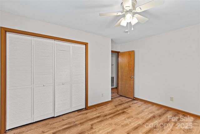 unfurnished bedroom with a closet, ceiling fan, and light hardwood / wood-style floors