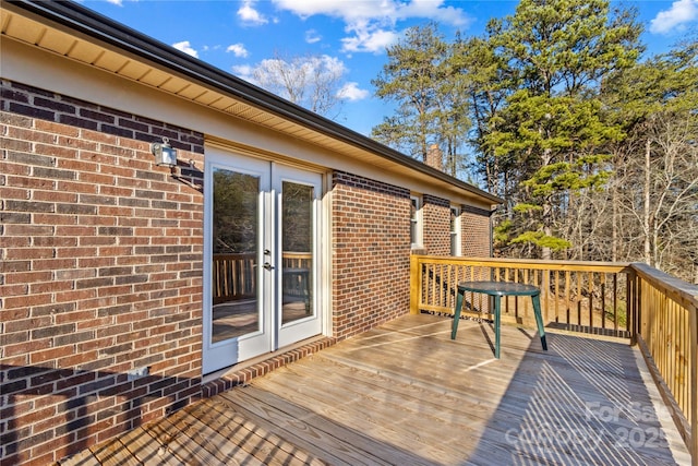 wooden deck with french doors