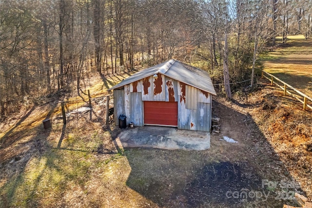 view of outbuilding featuring a garage