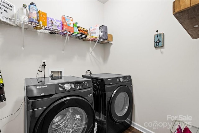 washroom with independent washer and dryer