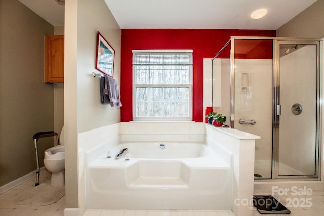 bathroom with shower with separate bathtub