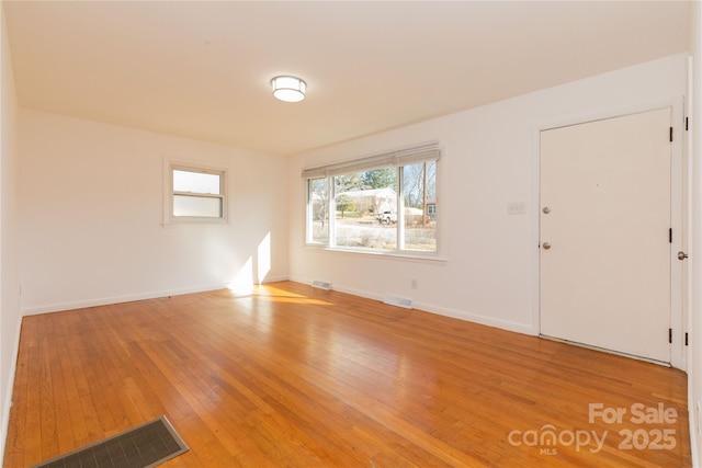 interior space with hardwood / wood-style floors