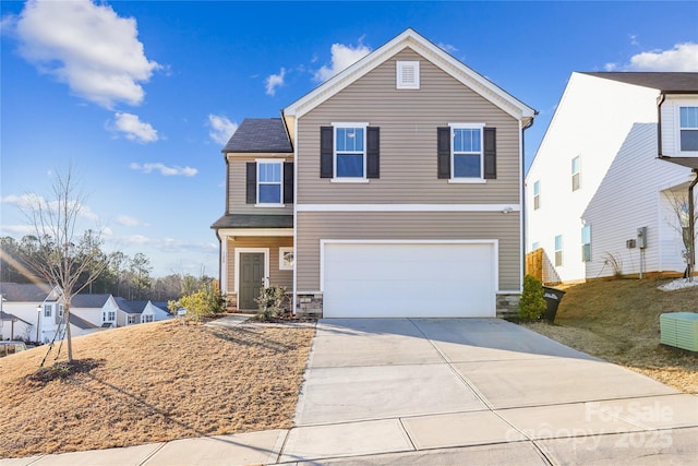 view of front property with a garage