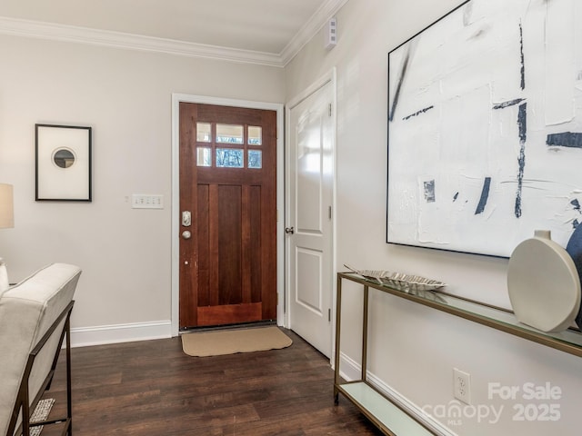 entrance foyer featuring dark hardwood / wood-style flooring and crown molding