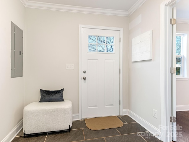 tiled foyer featuring crown molding and electric panel