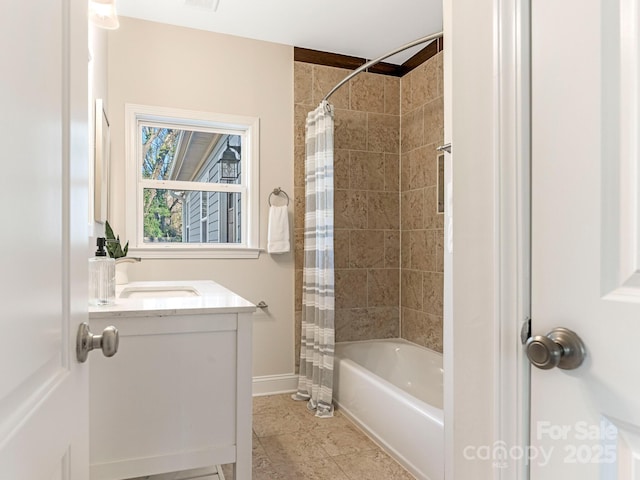 bathroom with vanity and shower / tub combo