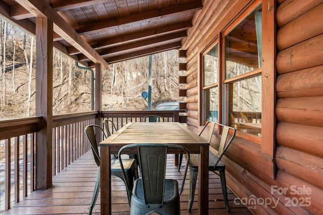 deck featuring outdoor dining area