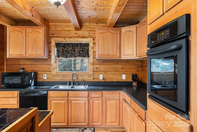 kitchen with wooden walls, beamed ceiling, wood ceiling, black appliances, and a sink