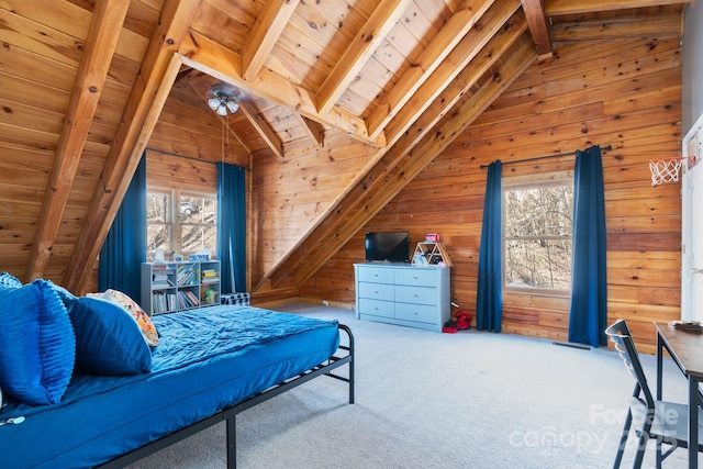 carpeted bedroom featuring lofted ceiling with beams, wooden walls, and wood ceiling