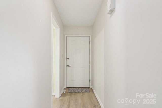 hall featuring light wood-type flooring