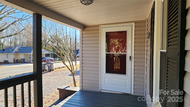 entrance to property with covered porch