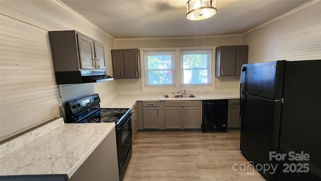 kitchen featuring black appliances, crown molding, sink, light hardwood / wood-style flooring, and extractor fan